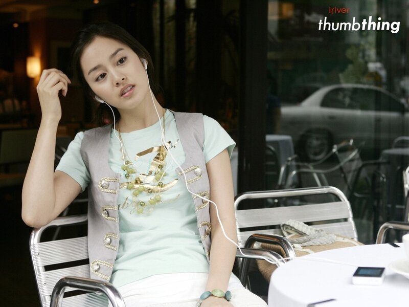 Woman Sitting at Cafe