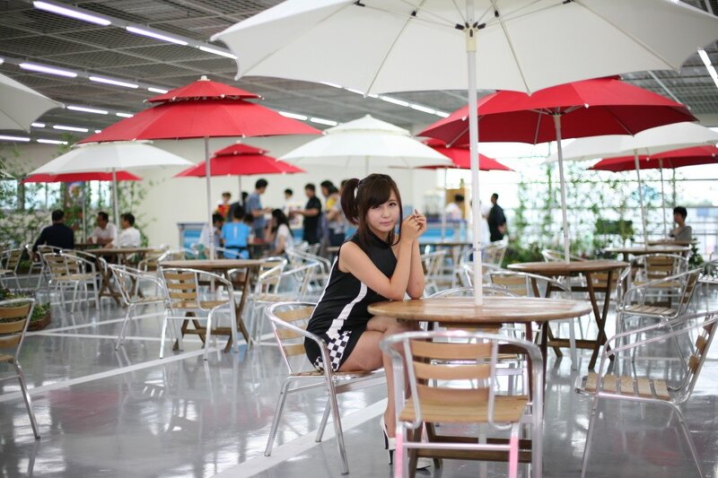 Woman sitting at outdoor cafe