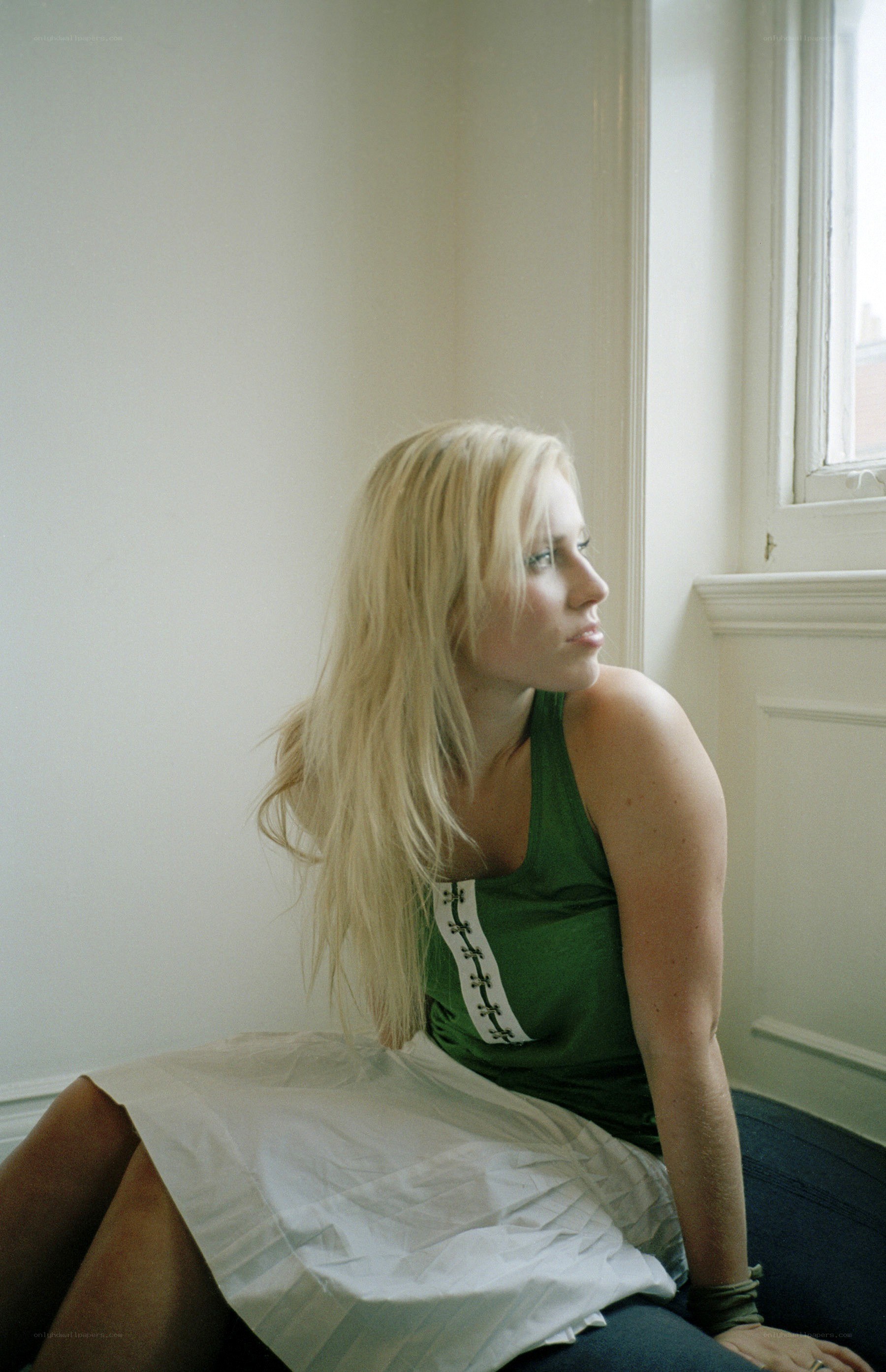 woman sitting by a window