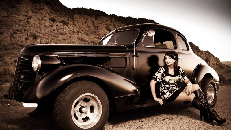 Woman Sitting by Car — Brown, Dramatic, Afternoon