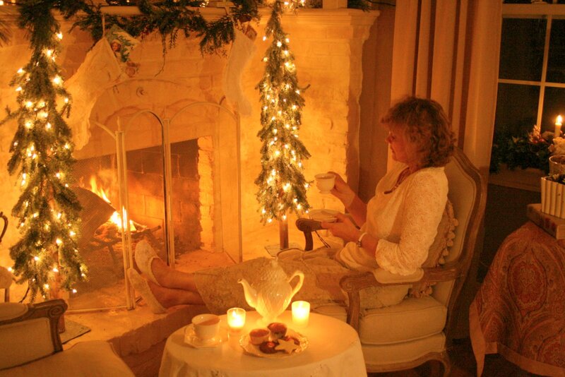 Woman Sitting by Fireplace — Yellow