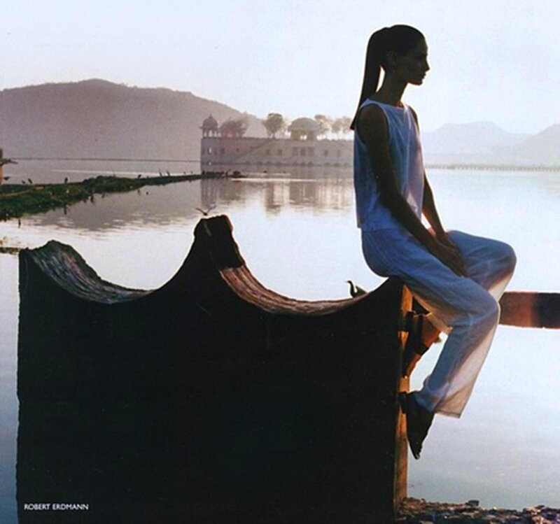 Woman Sitting by Lake — Blue