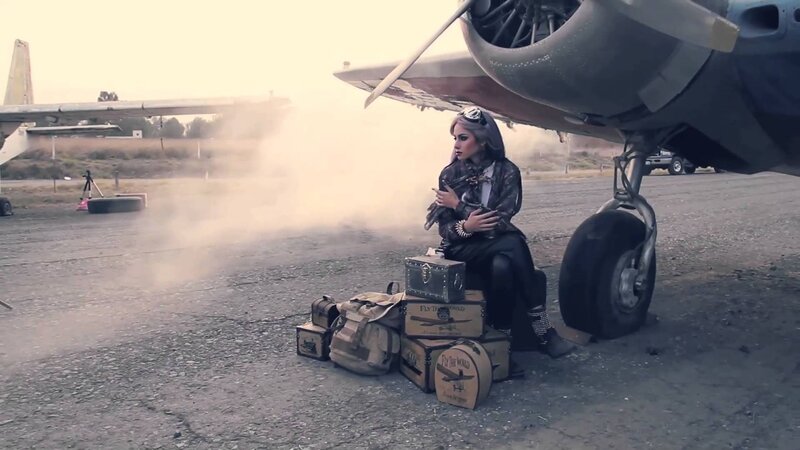 Woman Sitting by Plane