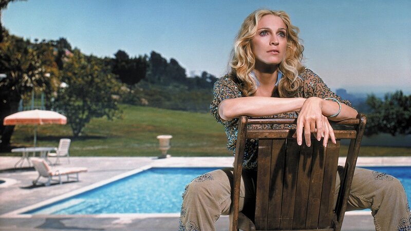 Woman Sitting by Pool — Blue, Serene, Afternoon