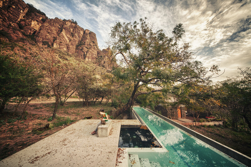 Woman Sitting by Pool — Green, Serene