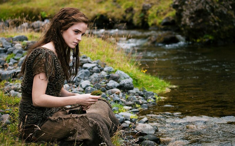 Woman Sitting by River — Green, Serene