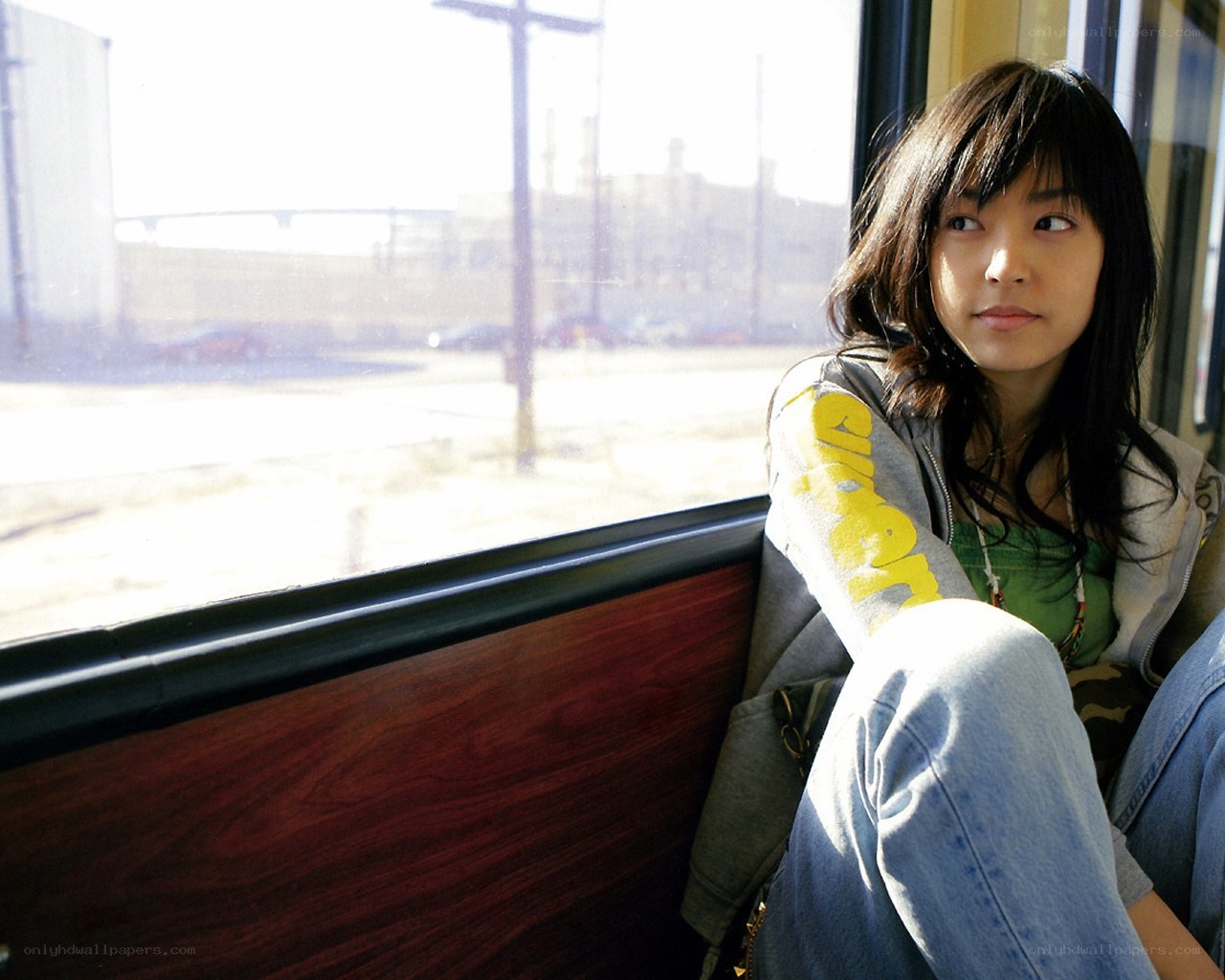 woman sitting by train window