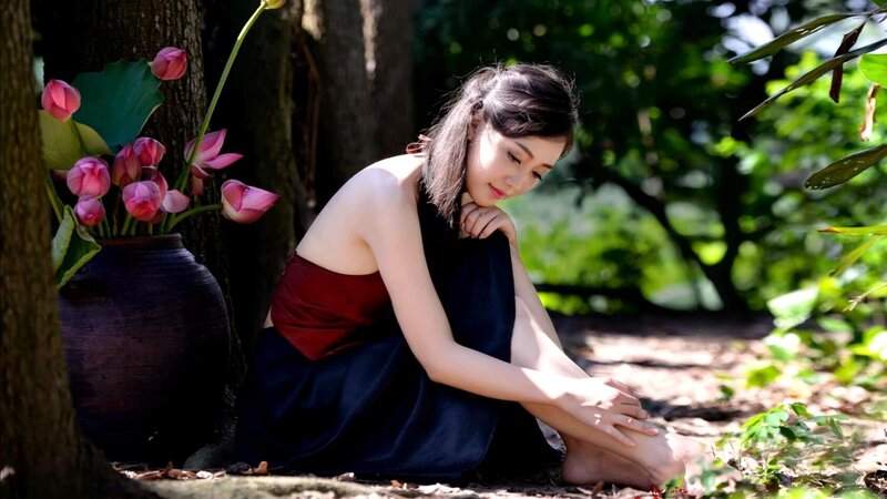 Woman Sitting by Tree — Black, Serene