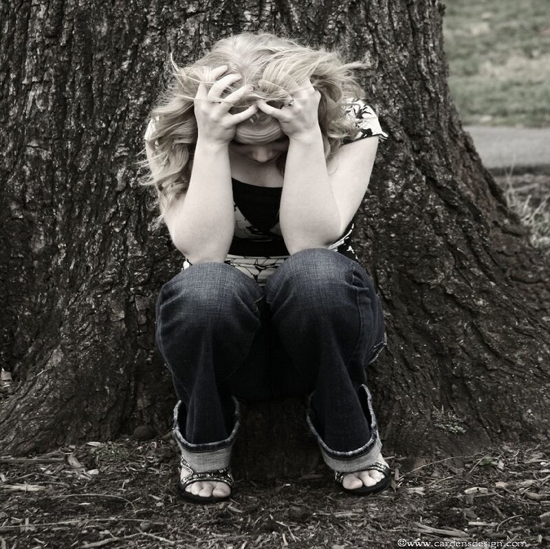 Woman Sitting by Tree — Black, Somber