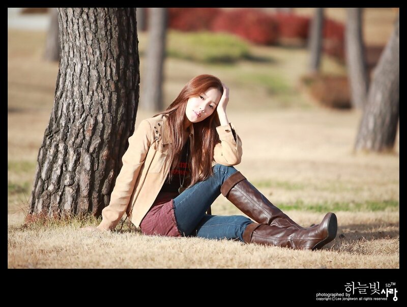 Woman Sitting by Tree — Brown, Calm, Autumn, Photograph