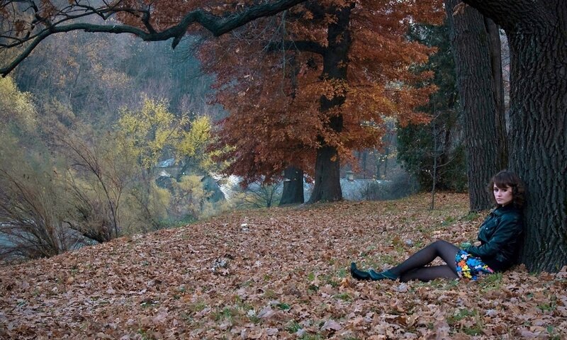 Woman Sitting by Tree — Brown, Melancholic