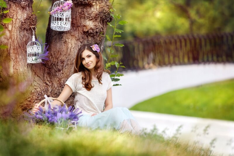 Woman Sitting by Tree — Green, Serene, Afternoon