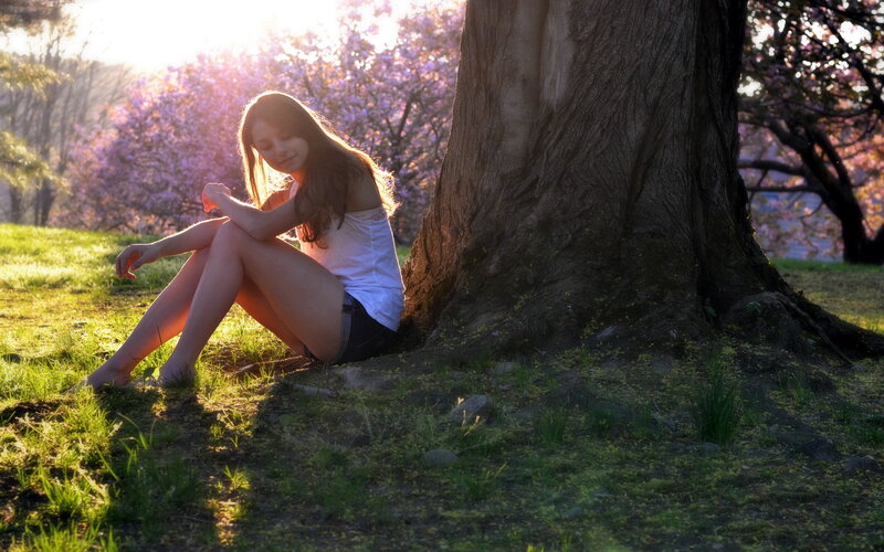 Woman Sitting by Tree — Green, Serene