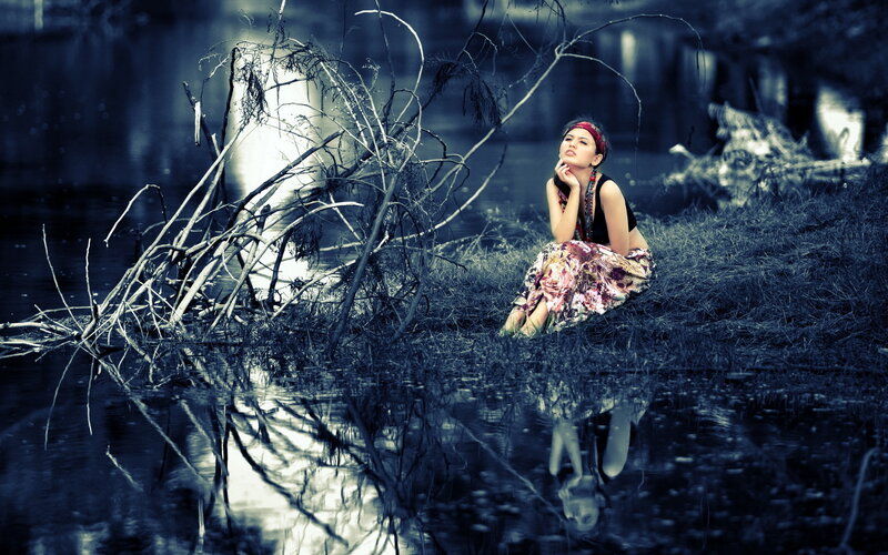 Woman Sitting by Water — Blue, Dramatic