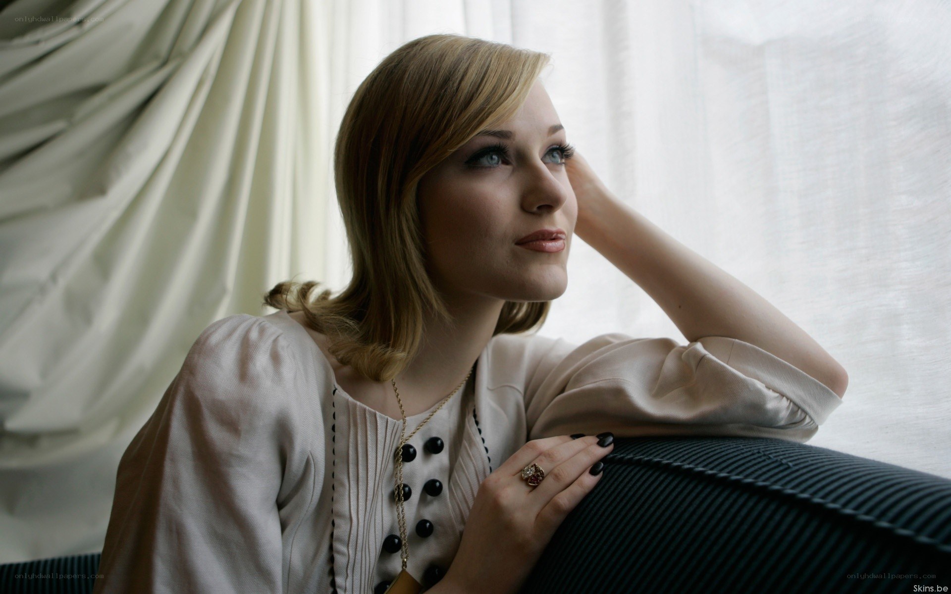 woman sitting by window