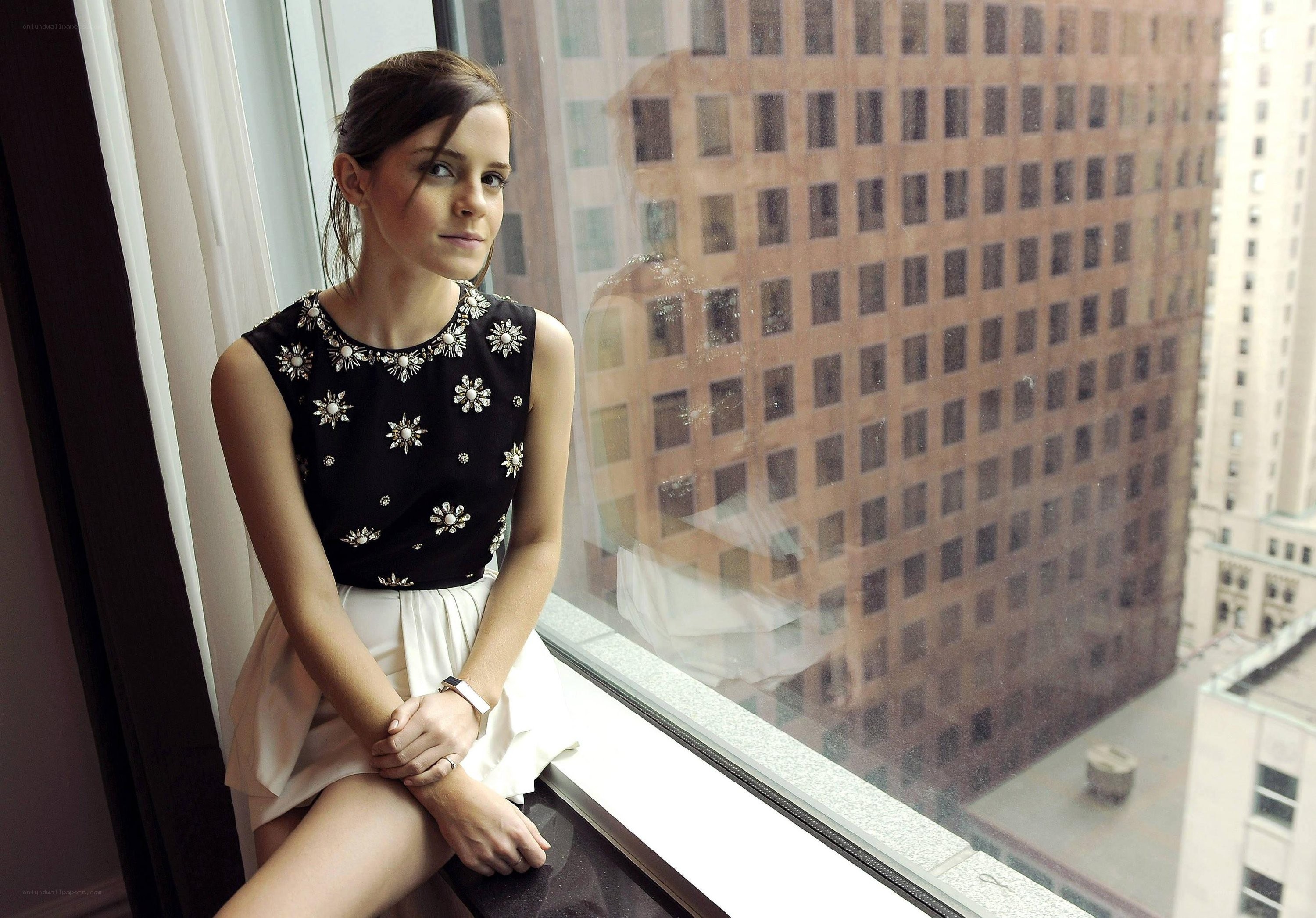 woman sitting by window