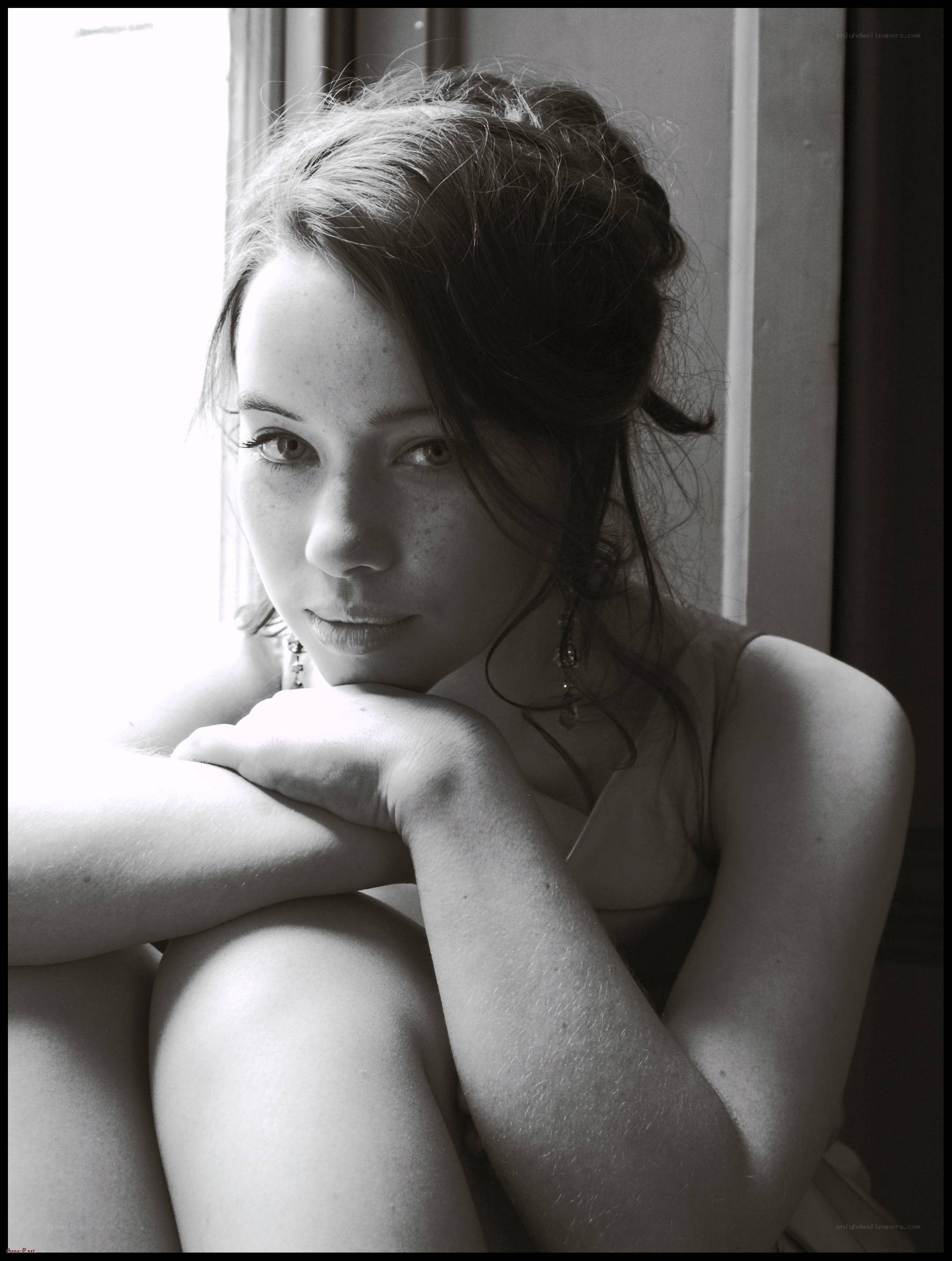 woman sitting by window