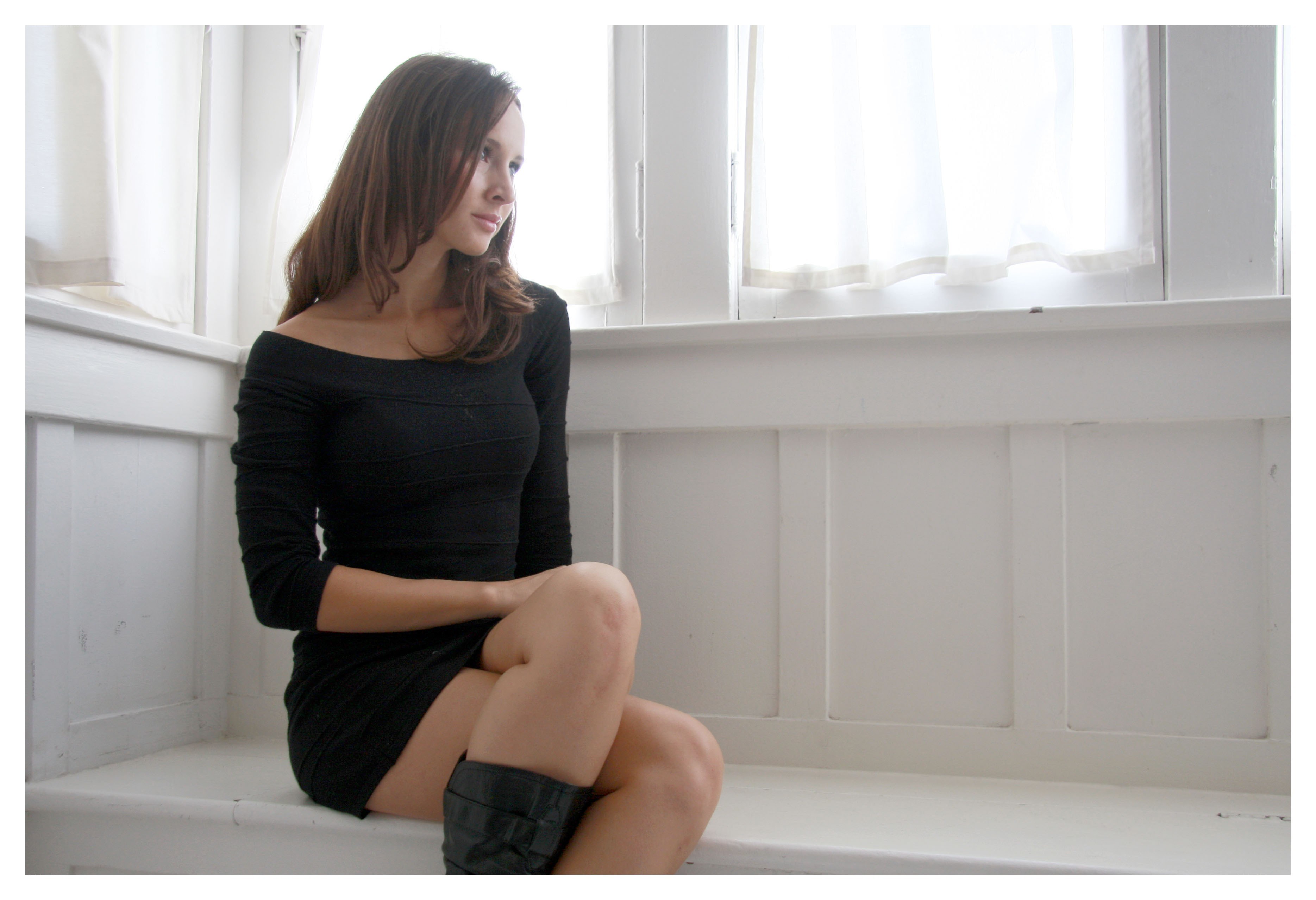 woman sitting by window
