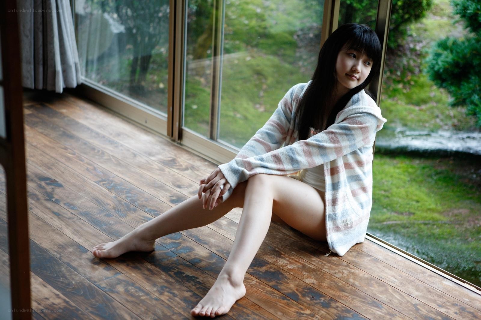 woman sitting by window
