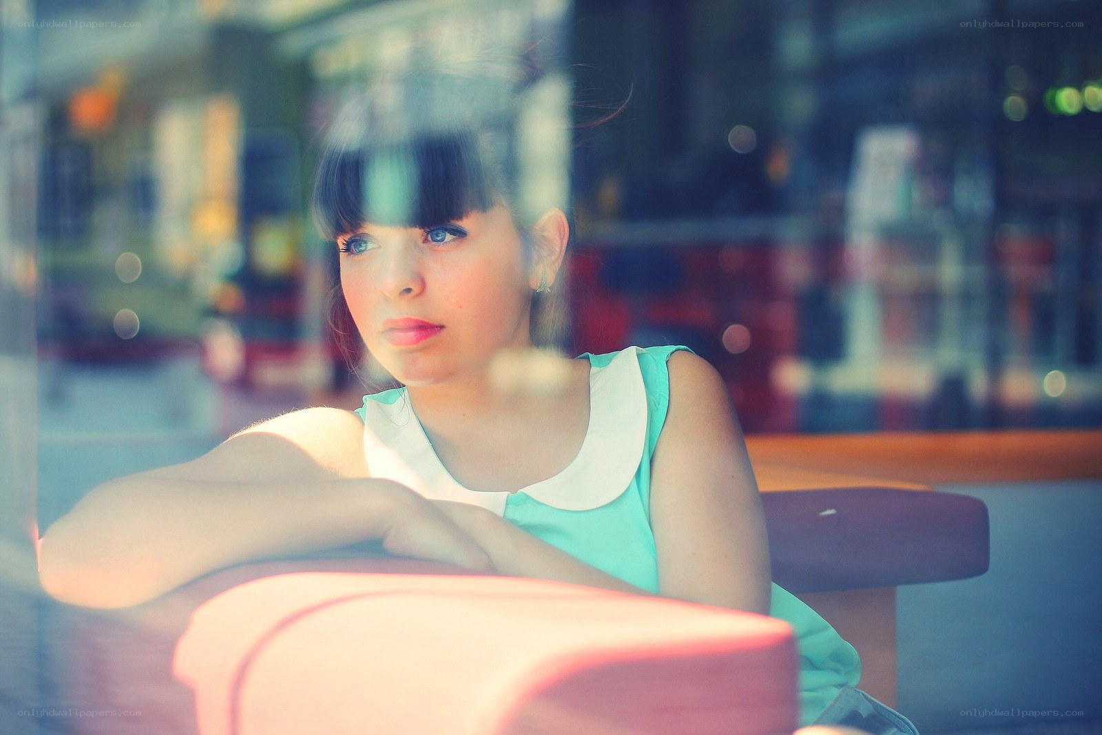 woman sitting by window