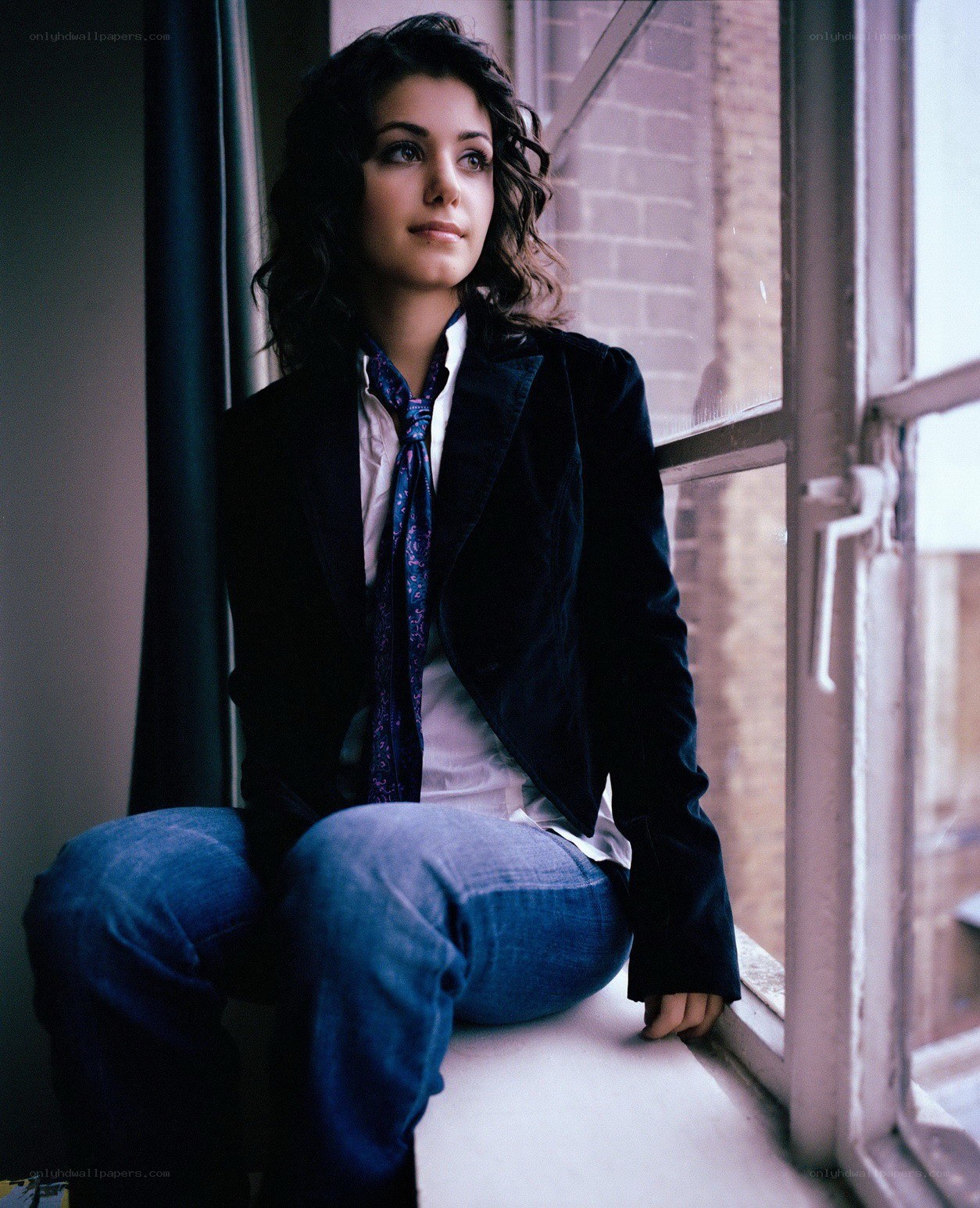 woman sitting by window