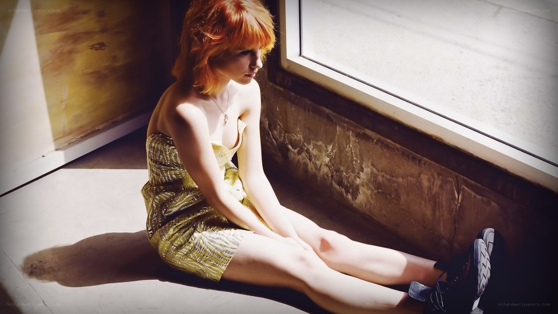 woman sitting by window
