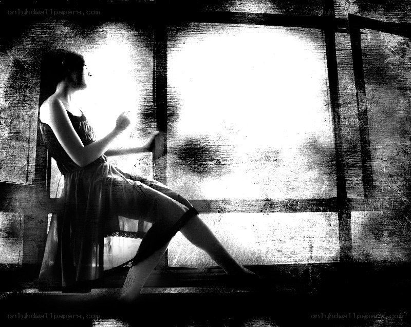 woman sitting by window