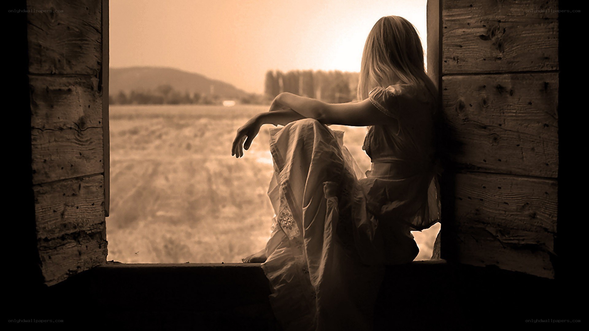 woman sitting by window