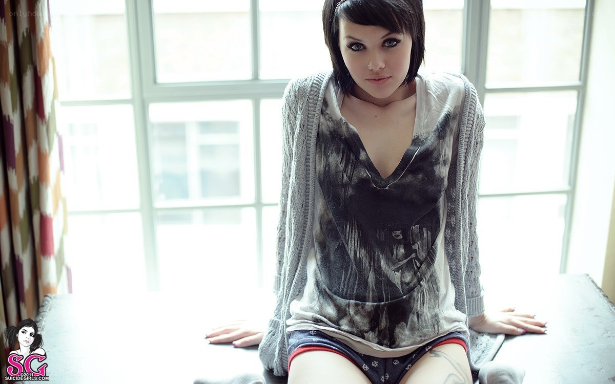 woman sitting by window