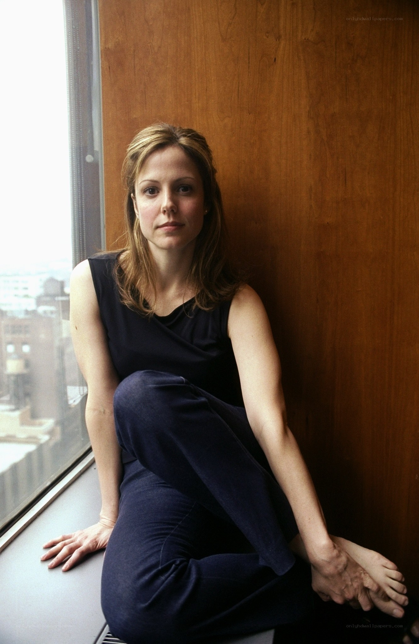 woman sitting by window