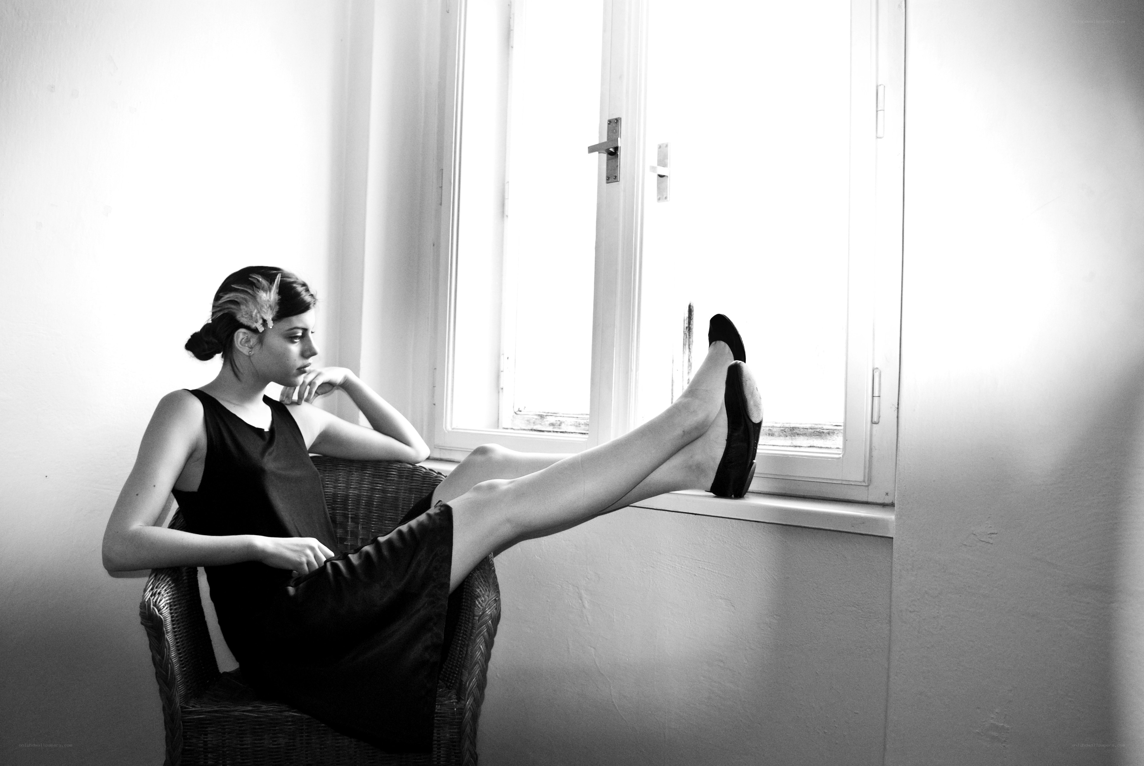 woman sitting by window