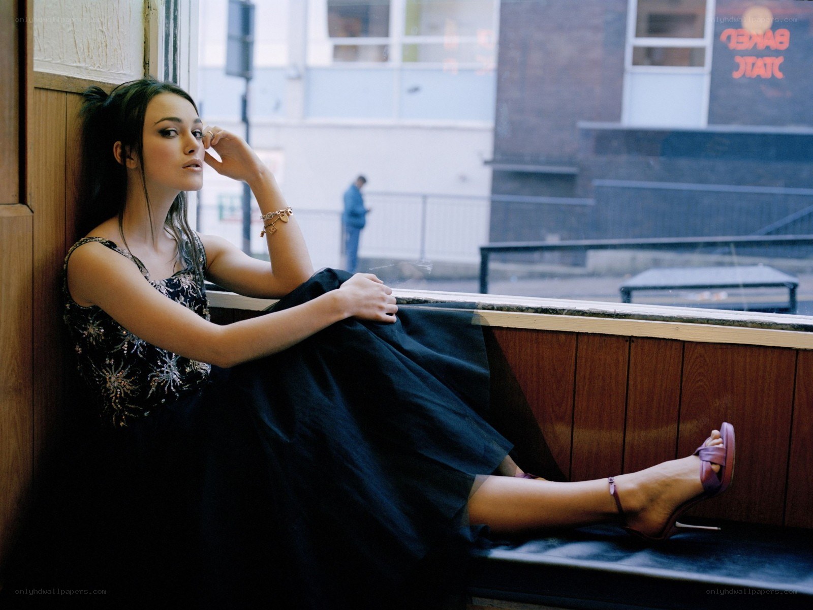 woman sitting by window