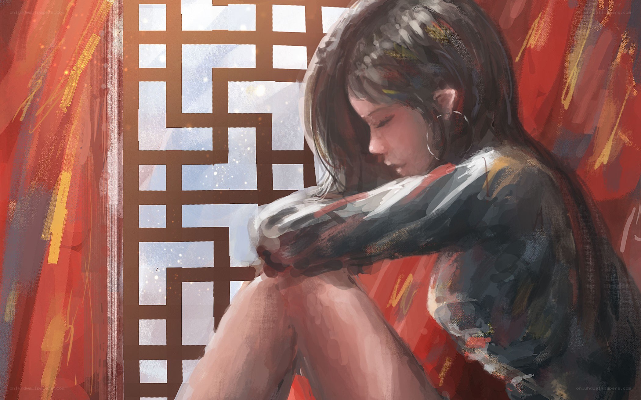 woman sitting by window