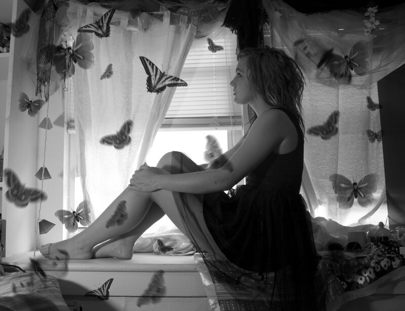 Woman Sitting by Window — Black, Dreamy
