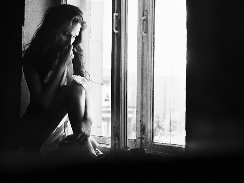 Woman Sitting by Window — Black