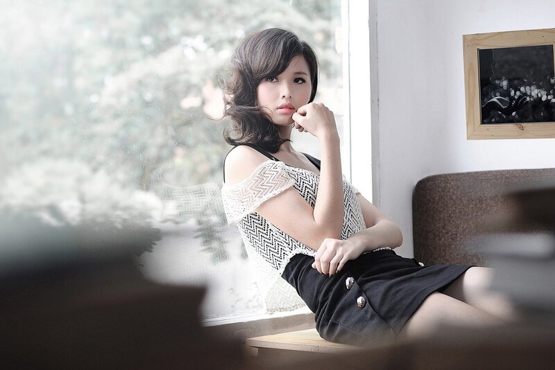 Woman Sitting by Window — White, Contemplative