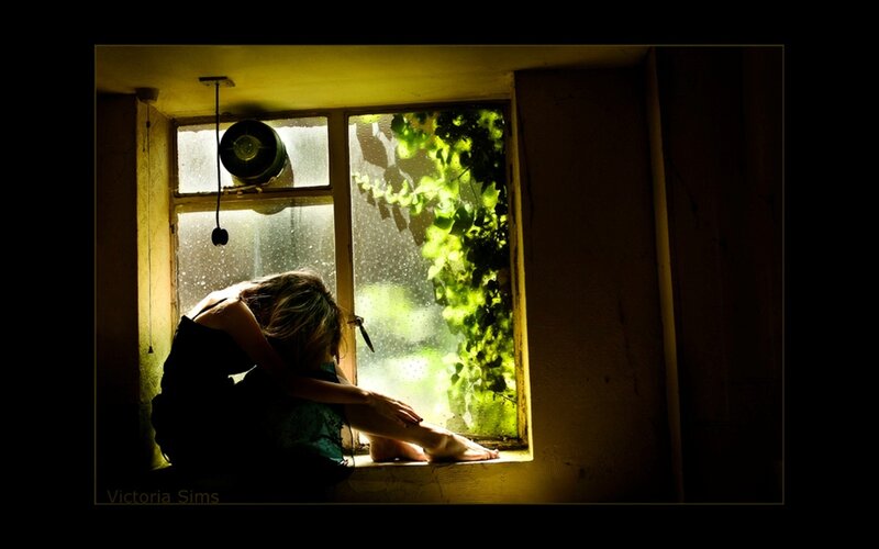 Woman Sitting by Window — Yellow, Dramatic