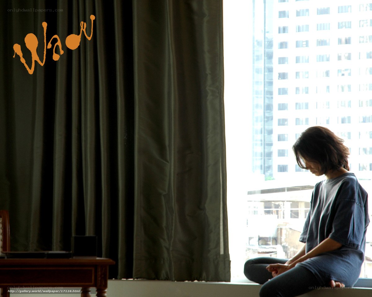 woman sitting by window