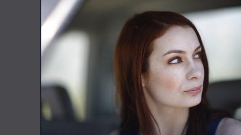woman sitting in a car