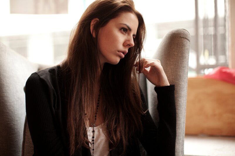 woman sitting in a chair