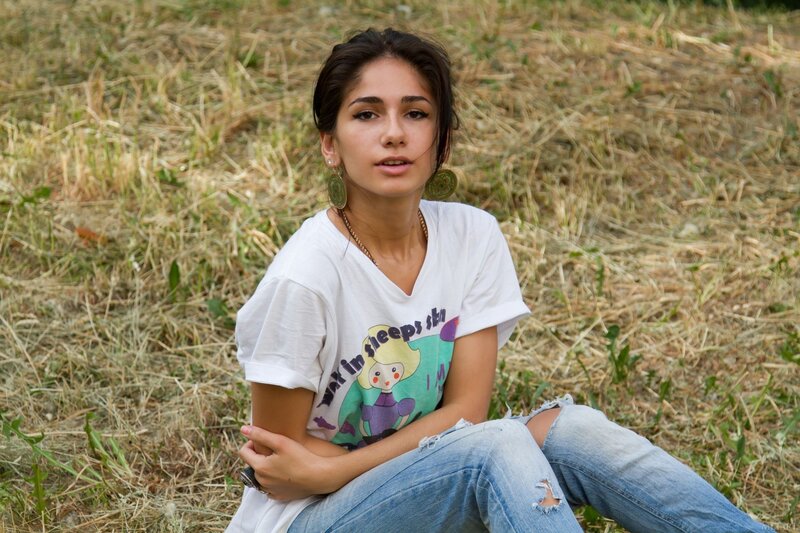 Woman sitting in a field
