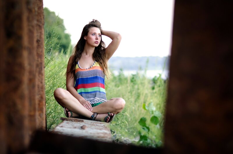 woman sitting in a field