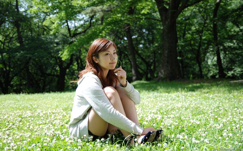 Woman sitting in a park