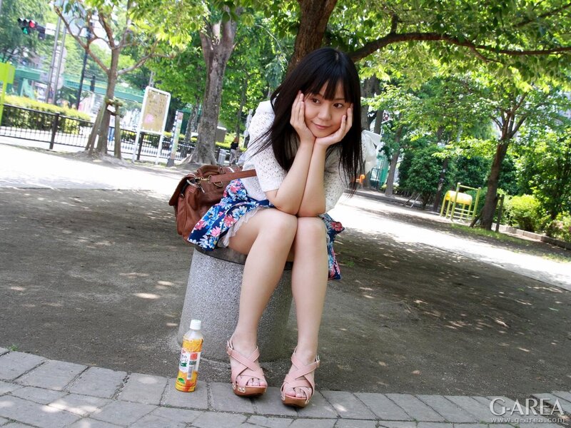 Woman sitting in a park