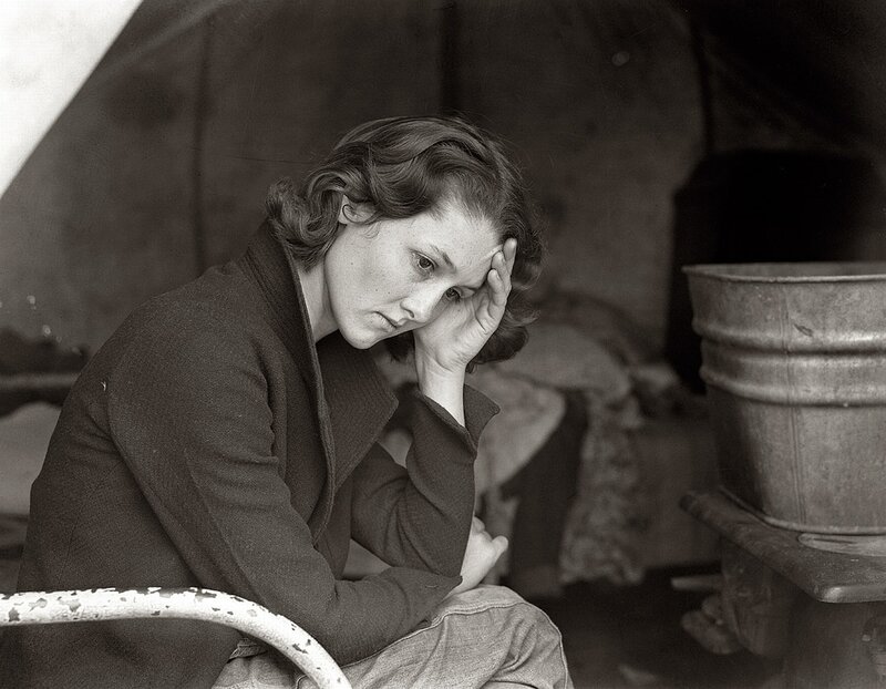 woman sitting in a tent