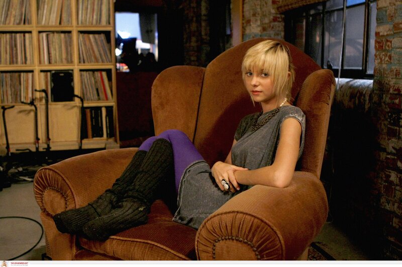 woman sitting in armchair