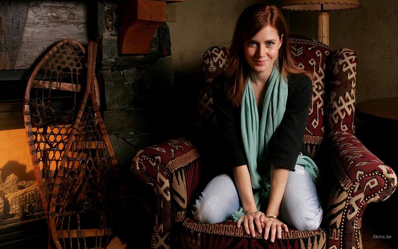 woman sitting in armchair