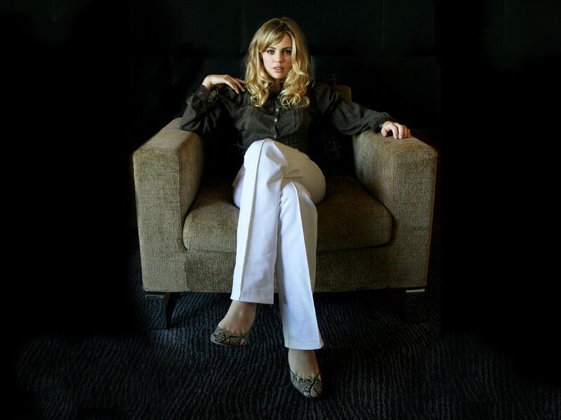 Woman Sitting in Armchair — Black