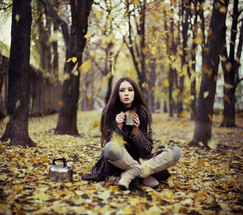 Woman Sitting in Autumn