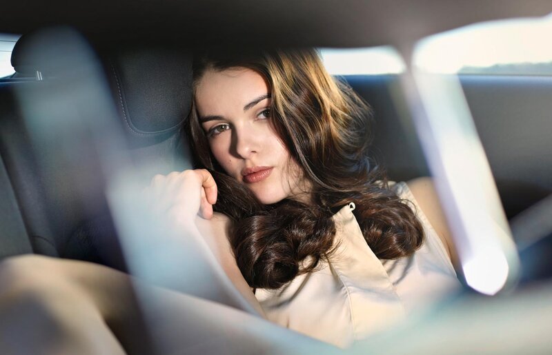 woman sitting in car
